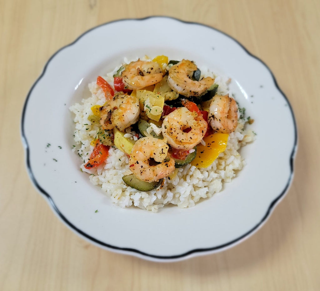 Grilled Shrimp over a Rice and Veggie Mix
